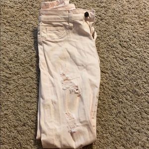 light pink distressed skinny jeans